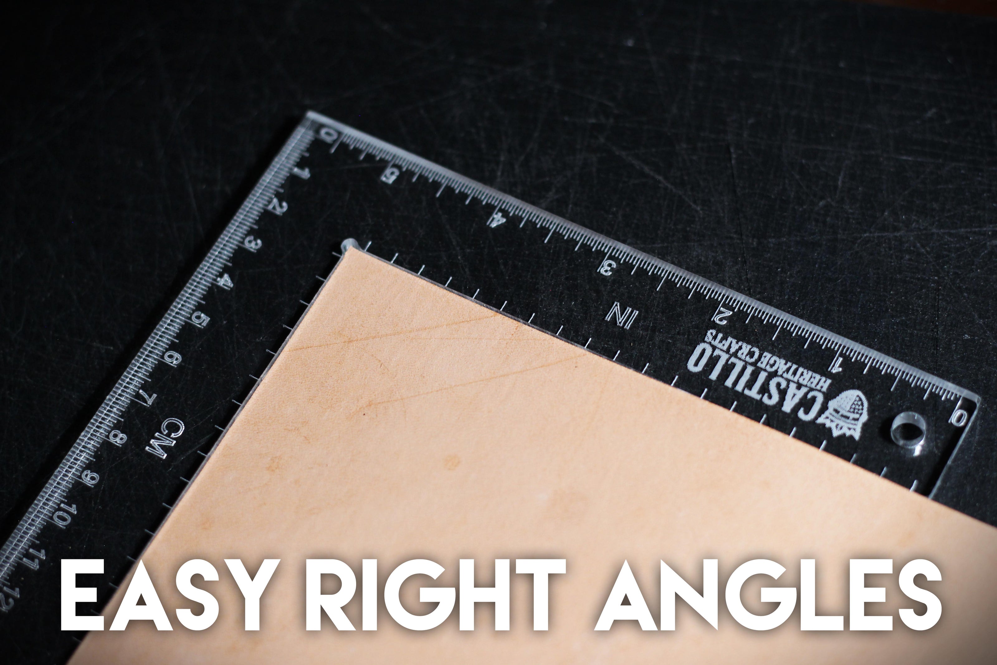 Clear plastic right angle ruler with measurement markings on a dark surface with 'Castillo Heritage Crafts' branding and 