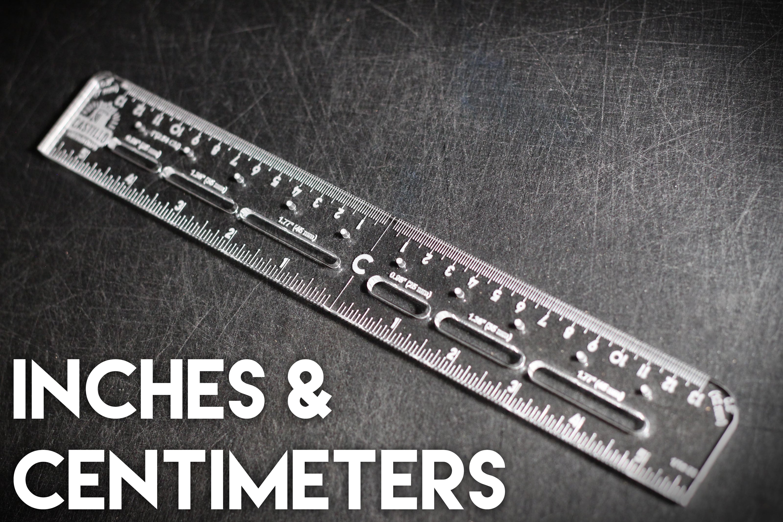 Castillo Heritage Crafts branded centering ruler on a dark surface with 