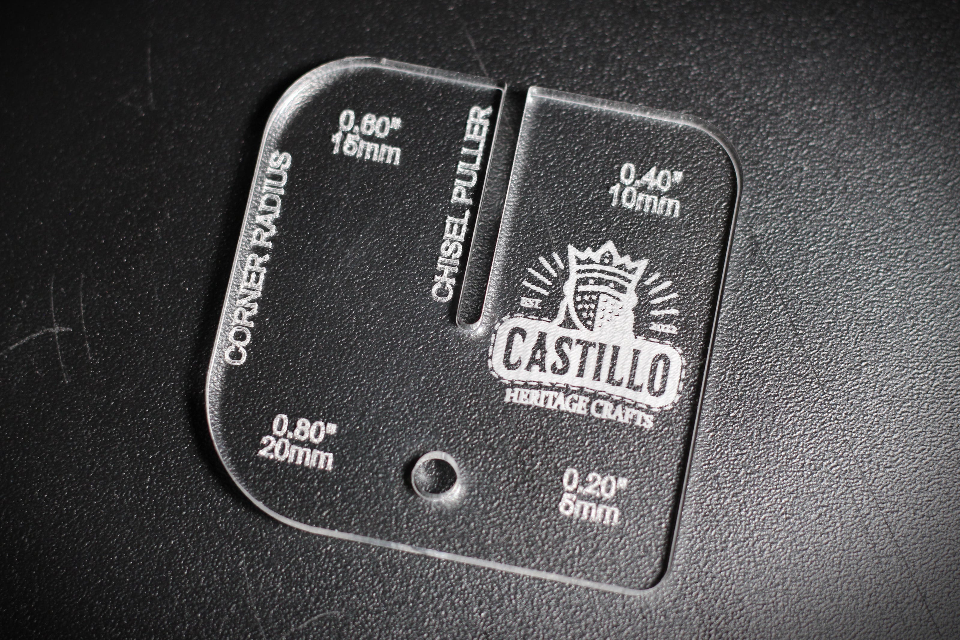 Acrylic leather craft chisel puller and radius tool with 'Castillo Heritage Crafts' branding on a dark background