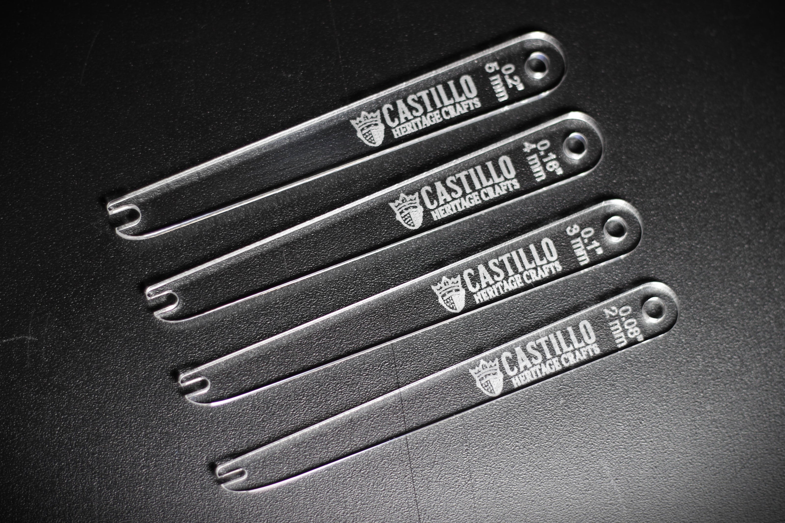 Castillo Heritage Crafts branded stitch line marker tool set of various sizes on a dark surface