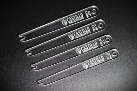 Castillo Heritage Crafts branded stitch line marker tool set of various sizes on a dark surface
