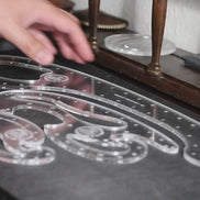 3-piece set of pro-grade French curves usage being demonstrated with cutting, tracing, and pattern-making