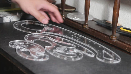 3-piece set of pro-grade French curves usage being demonstrated with cutting, tracing, and pattern-making